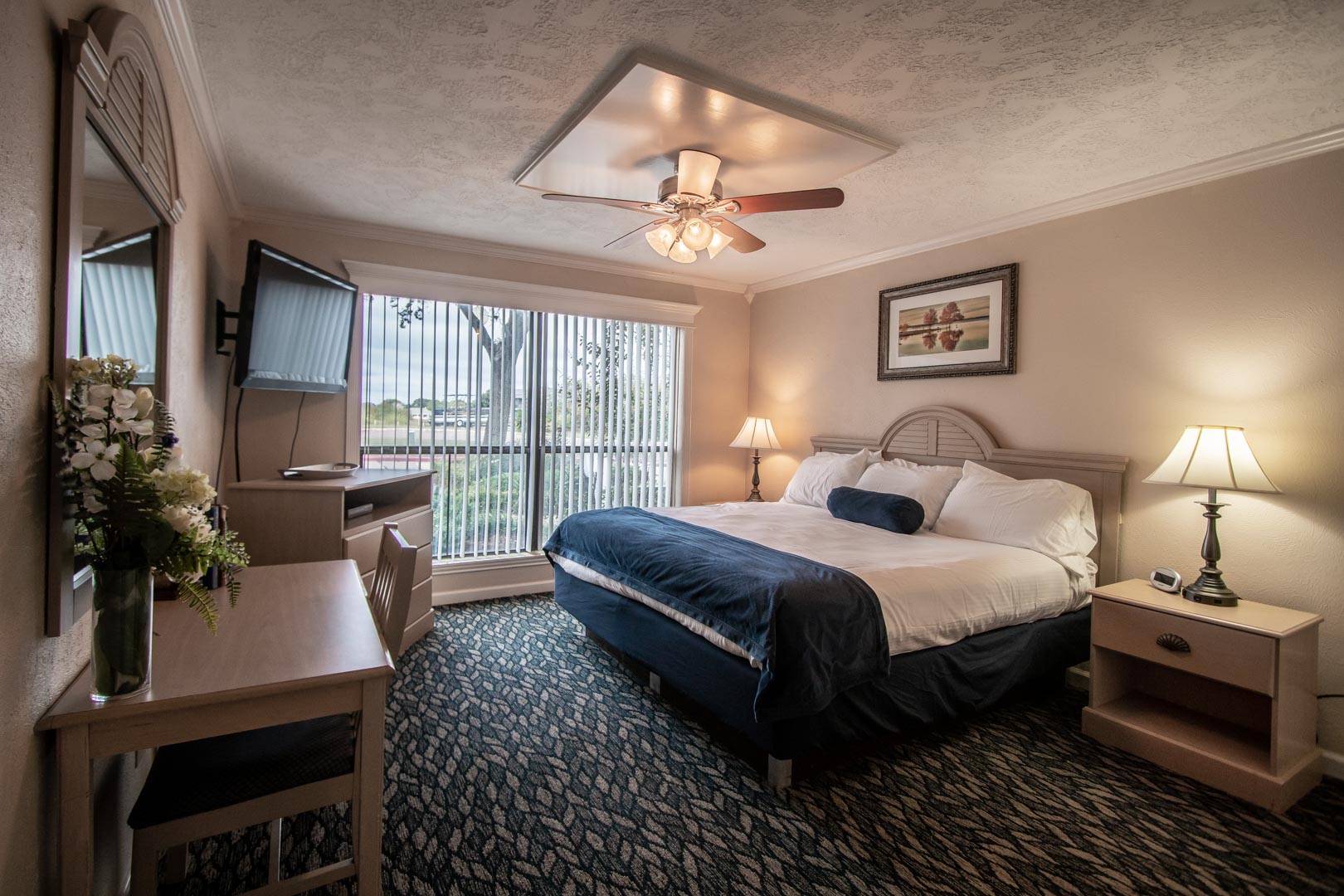 A spacious master bedroom at VRI's The Landing at Seven Coves in Willis, Texas.